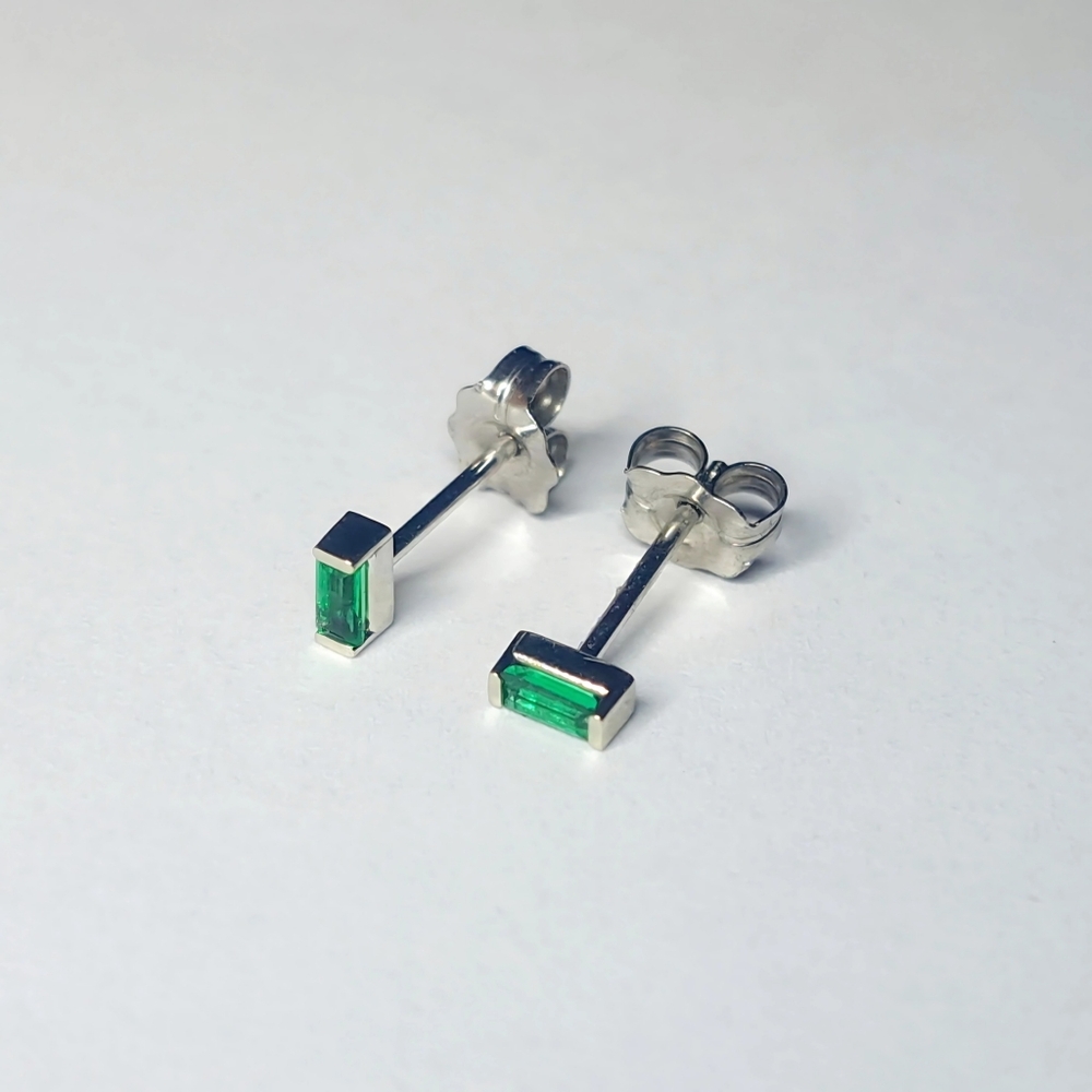 Petite Emerald Stud Earrings. 0.10 CTW, Solid 14K White Gold